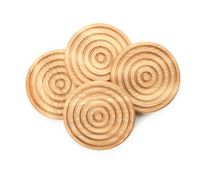 Wooden cup coasters on white background, top view