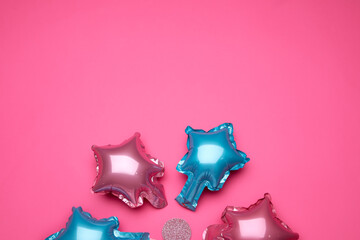 Beautiful different balloons on pink background