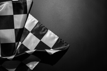 Racing flag on black background