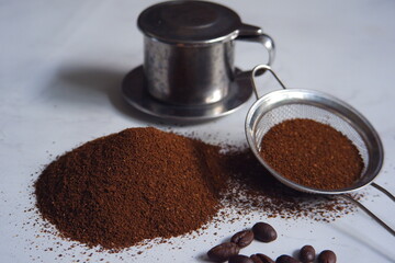 selective focus of coffee ground in white background 