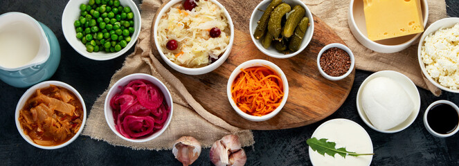 Best sources of probiotic on gray background.