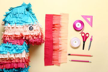 Preparation of Mexican pinata on light background