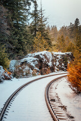 Abandoned train tracks covered in snow, located in Squamish BC, Canada near Whistler and Vancouver.