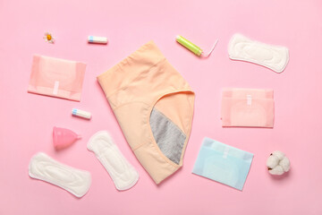 Composition with period panties, pads, menstrual cup and tampons on pink background - obrazy, fototapety, plakaty