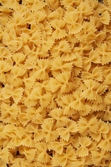 pasta concept the numbers of the bowtie or butterfly shaped farfalle pasta gathered in one place