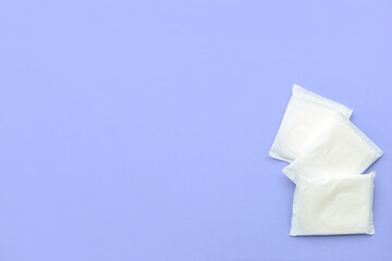 Menstrual pads on blue background