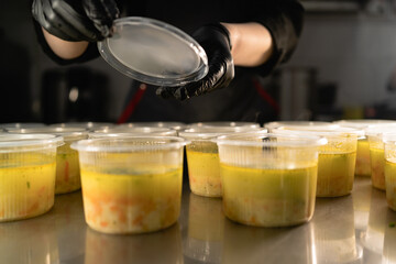 Small business food delivery. Disposable tableware with soup, takeaway order packaging, restaurant food lunch, office lunch boxes