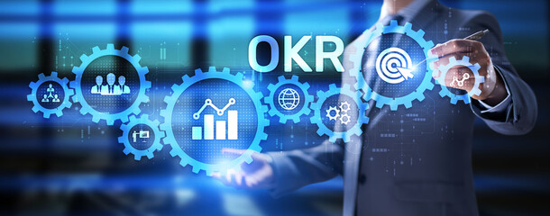 Obraz premium OKR Objective key result business finance concept on screen.