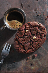Large chocolate cookie and coffee