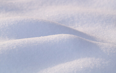 Abstract snow background. Snowdrifts.