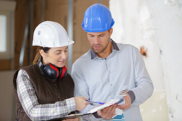 portrait of two construction workers