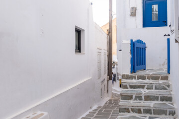 Fototapeta premium Cyclades, Greece. Ios, Nios island, Chora. Whitewashed buildings and narrow cobblestone alley.