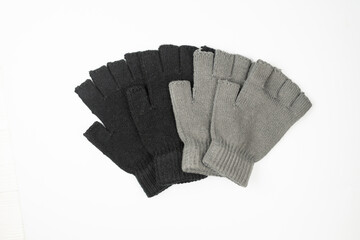 Black gloves isolated on a white background.