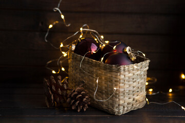 wicker box with Christmas decor and lights