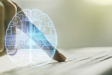 Double exposure of creative human brain microcircuit with hand typing on computer keyboard on...