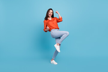 Fototapeta na wymiar Full length body size view of attractive cheerful girl dancing having fun rejoicing isolated over bright blue color background