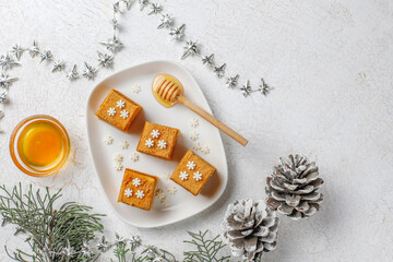 Honey cake Medovik mini slices decorated christmas sprinkles.