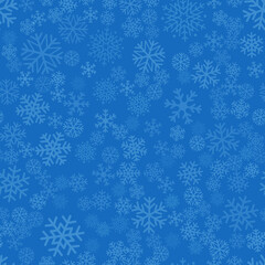 Fototapeta na wymiar Seamless winter background consisting of snowflakes of different shapes placed chaotically. Snowflakes placed on blue background. Christmas and new year symbol and mood.