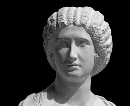 Bust of the Empress Julia Domna. Ancient sculpture isolated on black background. Classic antiquity woman portrait