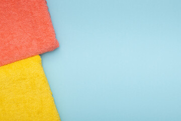 Composition of colored cotton towels. The concept of softness and purity