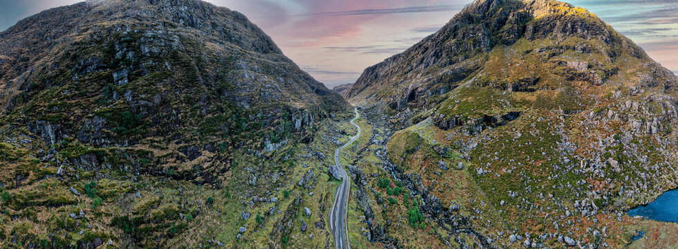 Aerial view of the winding roads at Gap of Dunloe in Ring of Kerry, a narrow mountain pass running north to south of county Kerry, Ireland