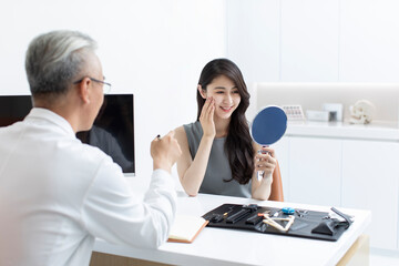 Doctor talking with patient in the office