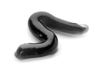 Sample of black toothpaste on white background