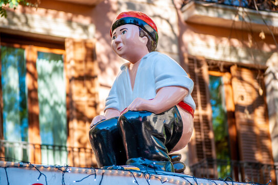 Christmas caganer statue, figurine of pesebre, man pooping