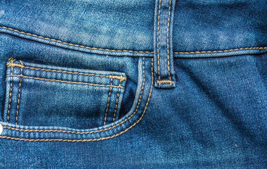 Jeans background. Denim fabric closeup. Textures of clothing fabric with fashion embroidery blue colors. Copy space for text. Fashion and Style.