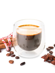 Glass of tasty coffee with cinnamon on white background