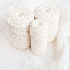 Handmade macrame braiding and cotton threads. Image good for macrame and handicrafts banners and advertisement.  Close up