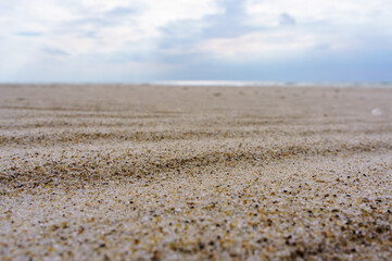 Sea sand. Sandy background. Sandy texture. Natural sea sand and river sand.