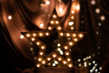 Wooden star with lights for christmas decoration