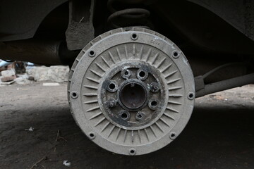 brake rotor of the rear wheel of the car. brake disk. car repair. close-up.