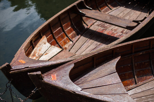 Two wooden boats on a lake