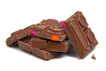 Chocolate pieces snack stack isolated on the white background