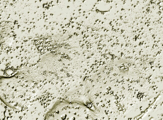 Abstract background with bright drops. Imitation of material.