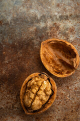 single walnut  on a rustic background .
