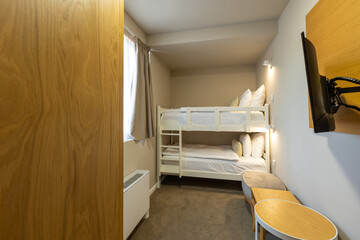 Fototapeta na wymiar Bunk beds in small bedroom