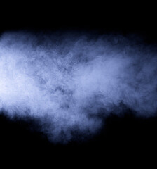 Volumetric smoke on a black background. A bluish abstract fog.