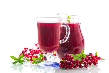 freshly squeezed thick natural juice with pulp from ripe red viburnum in a decanter