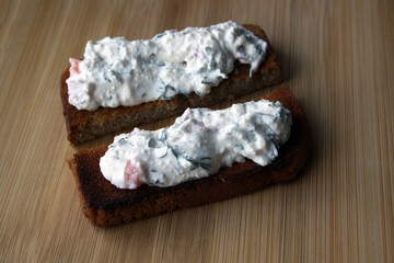 Cottage cheese dip and black bread toast. Breakfast.