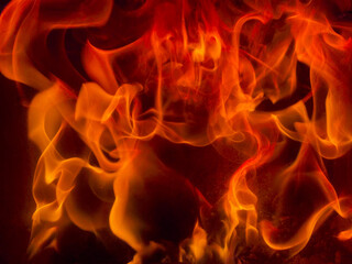 Burning powerblaze fire flame texture background. Fire creates infinity shapes when it burns. The...