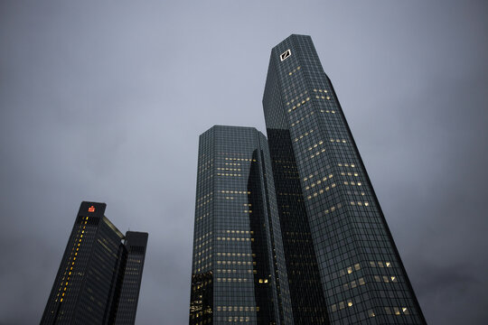 frankfurt, hesse, germany - 13 12 2021: the bank tower of the deutsche bank and the sparkasse in frankfurt am main