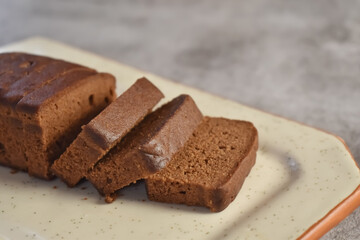 Selective focus picture of a chocolate cake slices in a plate.