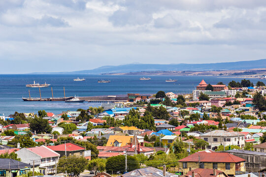 Aerial view of the Punta Arenas town with Strait of Magellan on background (Mirador Cerro De La Cruz). Skyline of Punta Arenas, Patagonia Chilena, Chile