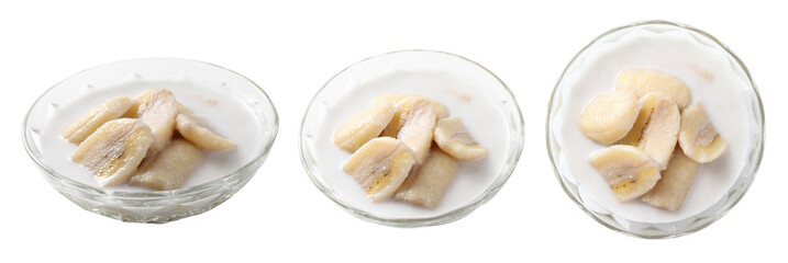 Thai dessert from banana and coconut milk on white background