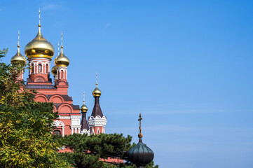 Fototapeta na wymiar Orthodox church on a background of blue sky