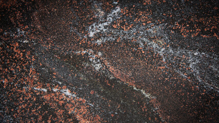 detail of black, brown and white marble