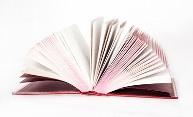 Isolated opened book with red pages